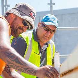 An instructor providing guidance to a trainee.