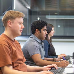 Learners engaging in computer-based learning.