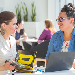 two learners discussing AI software